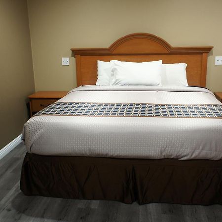 Executive Inn 德明 外观 照片