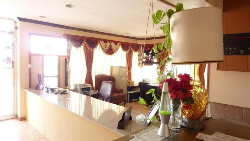 Executive Inn 德明 外观 照片