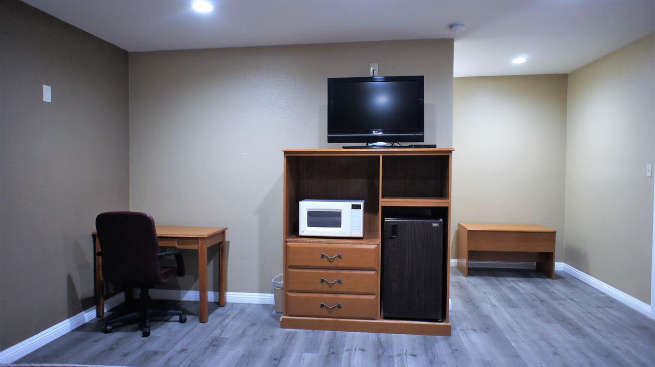 Executive Inn 德明 外观 照片