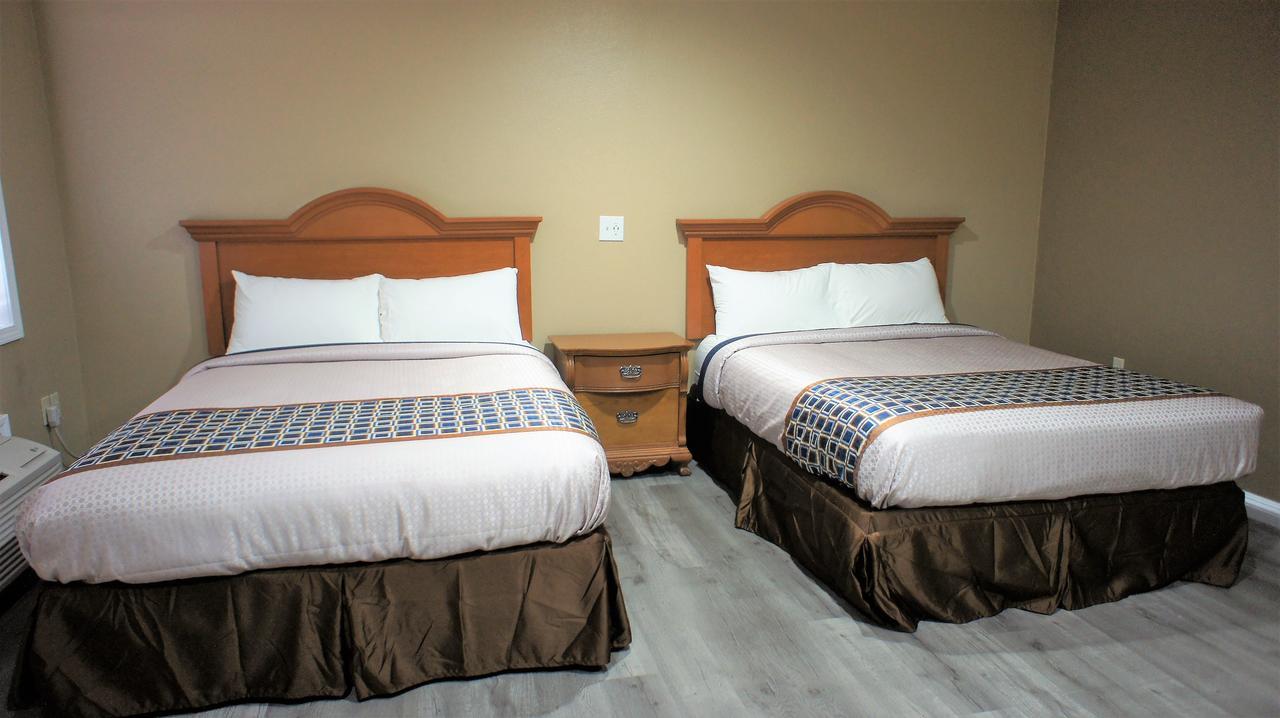 Executive Inn 德明 外观 照片